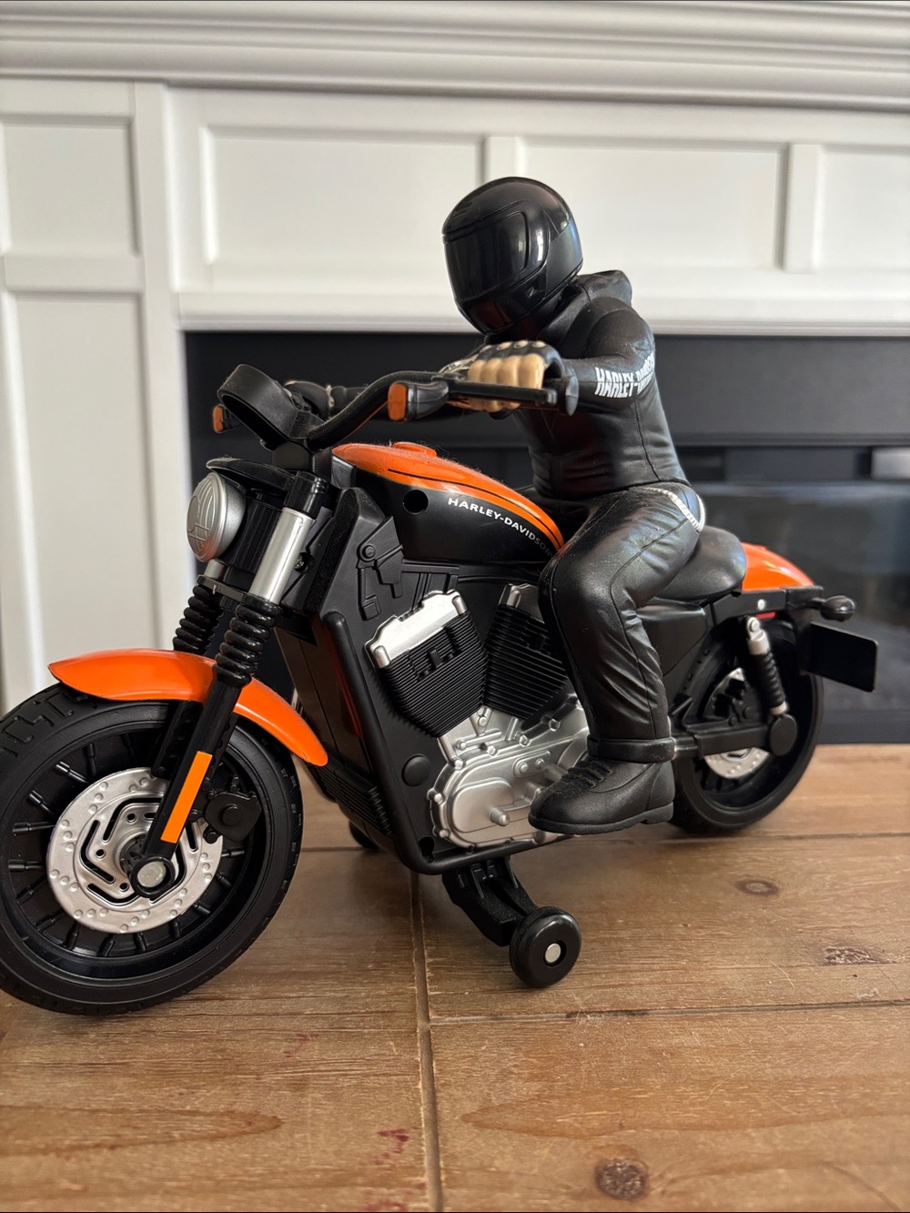 Harley-Davidson Black and Orange Ride-On Motorcycle Toy with Rider